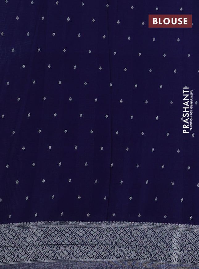 Banarasi semi crepe saree teal blue and navy blue with allover woven buttas and long silver zari woven border