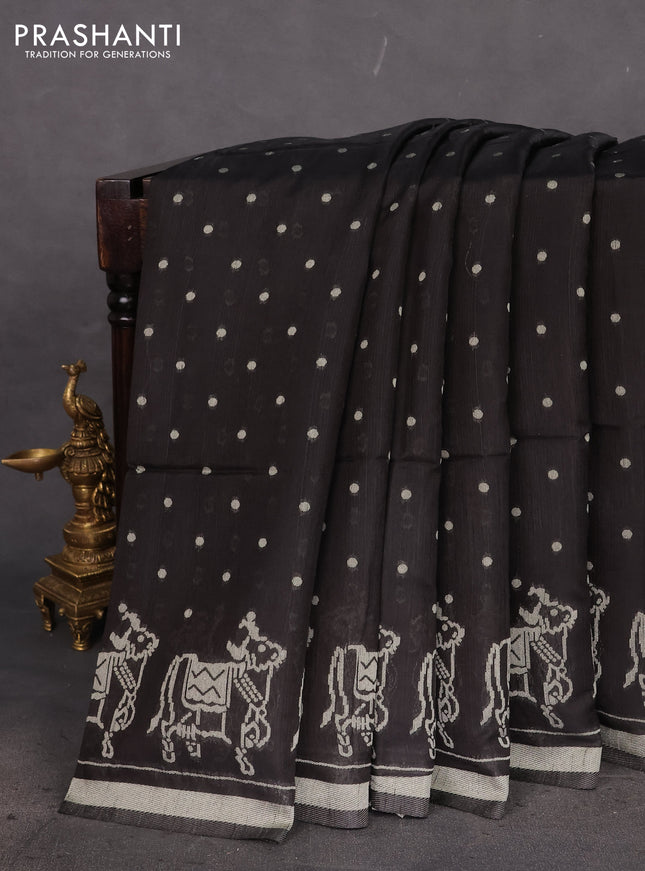 Semi tussar saree black with allover polka dot weaves and patola weaving pallu