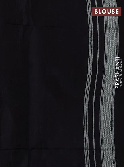 Semi tussar saree black with allover polka dot weaves and patola weaving pallu