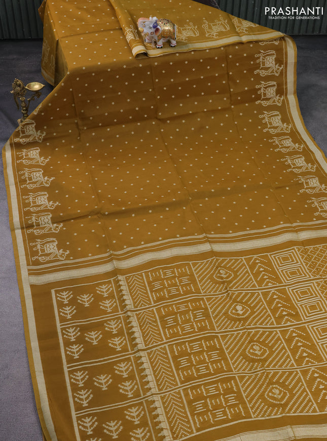 Semi tussar saree dark mustard with allover polka dot weaves and patola weaving pallu