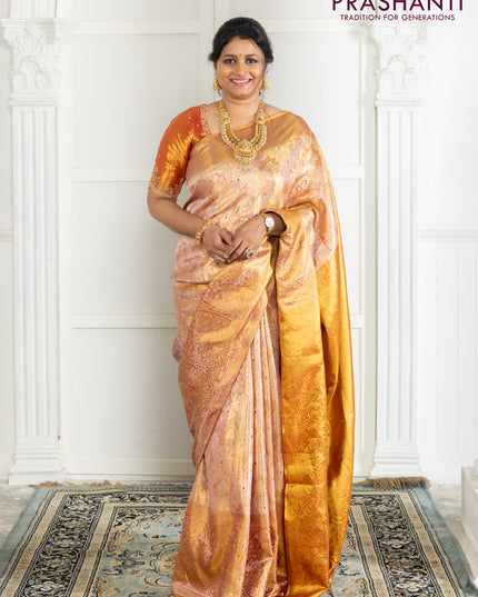 Kanchipuram tissue silk saree dual shade of pink and red with allover zari woven brocade weaves and zari woven border