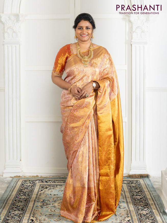 Kanchipuram tissue silk saree dual shade of pink and red with allover zari woven brocade weaves and zari woven border