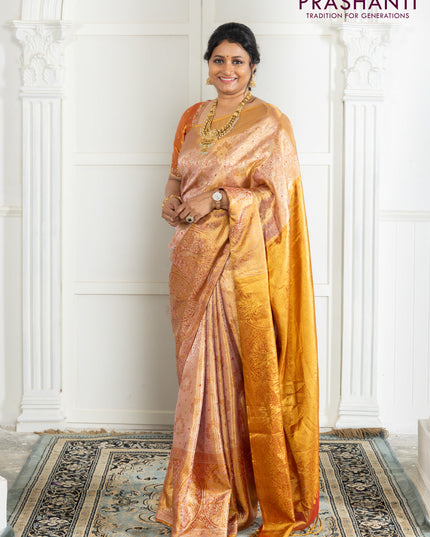 Kanchipuram tissue silk saree dual shade of pink and red with allover zari woven brocade weaves and zari woven border