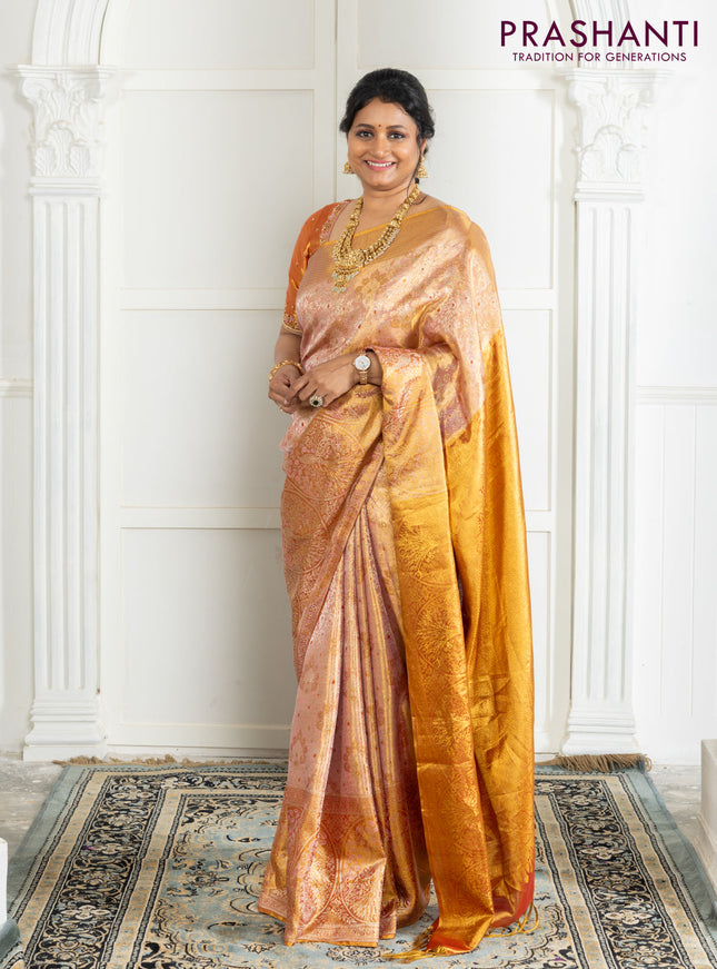 Kanchipuram tissue silk saree dual shade of pink and red with allover zari woven brocade weaves and zari woven border