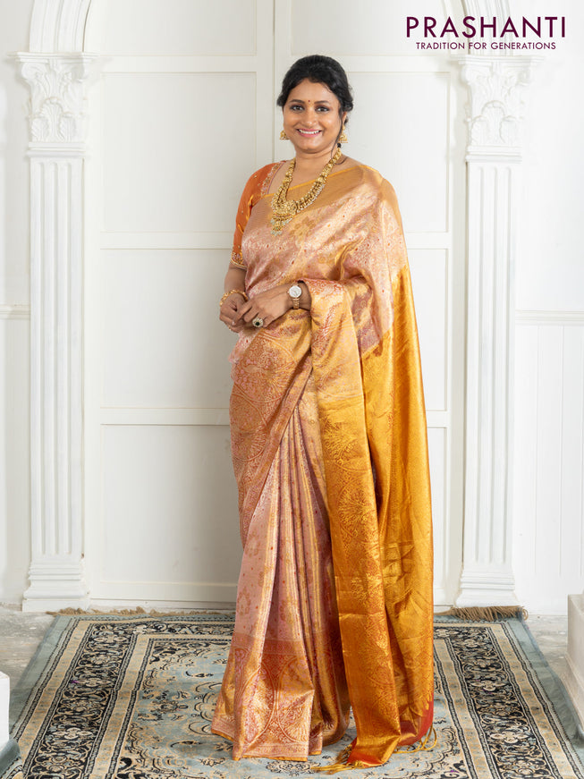 Kanchipuram tissue silk saree dual shade of pink and red with allover zari woven brocade weaves and zari woven border