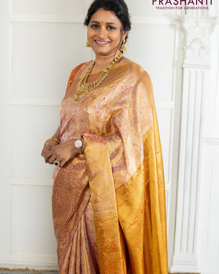 Kanchipuram tissue silk saree dual shade of pink and red with allover zari woven brocade weaves and zari woven border