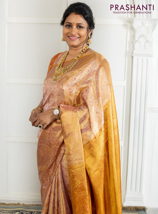 Kanchipuram tissue silk saree dual shade of pink and red with allover zari woven brocade weaves and zari woven border