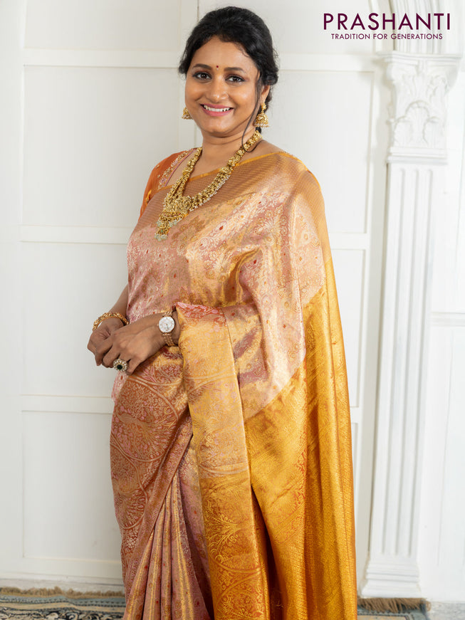 Kanchipuram tissue silk saree dual shade of pink and red with allover zari woven brocade weaves and zari woven border