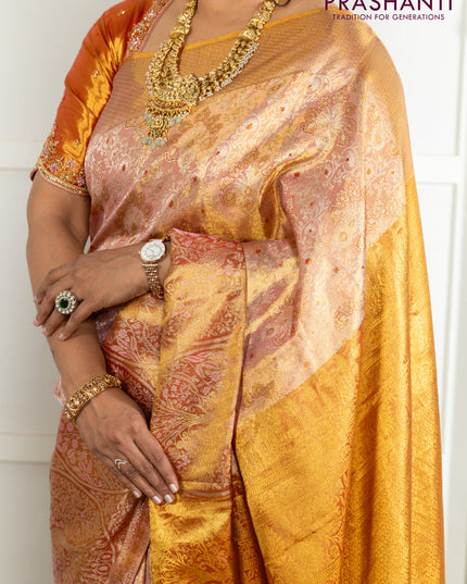 Kanchipuram tissue silk saree dual shade of pink and red with allover zari woven brocade weaves and zari woven border
