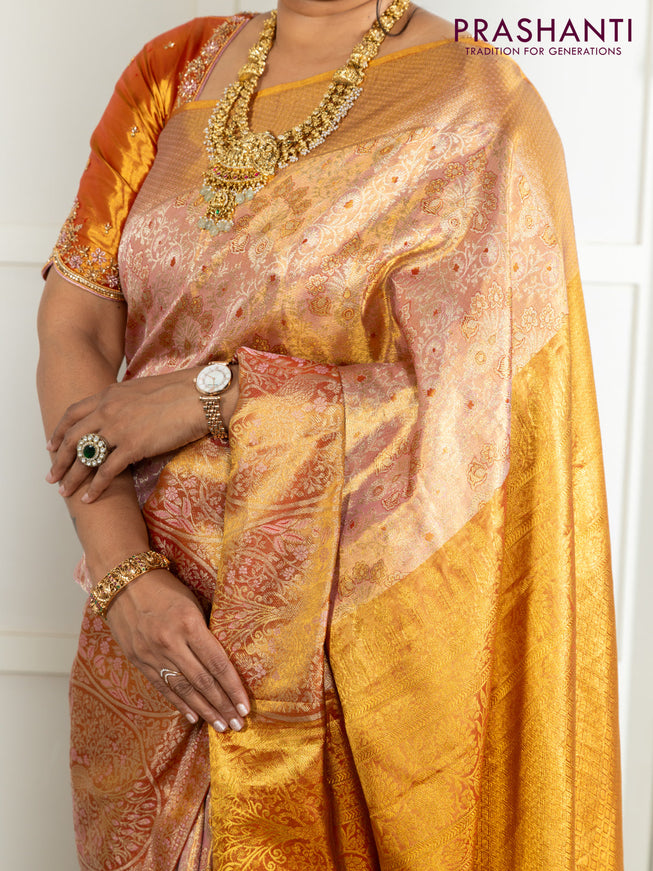 Kanchipuram tissue silk saree dual shade of pink and red with allover zari woven brocade weaves and zari woven border