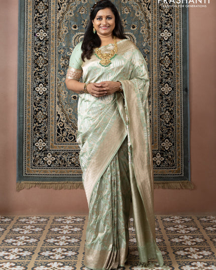 Banarasi uppada silk saree pista green with allover silver & gold zari weaves and zari woven border
