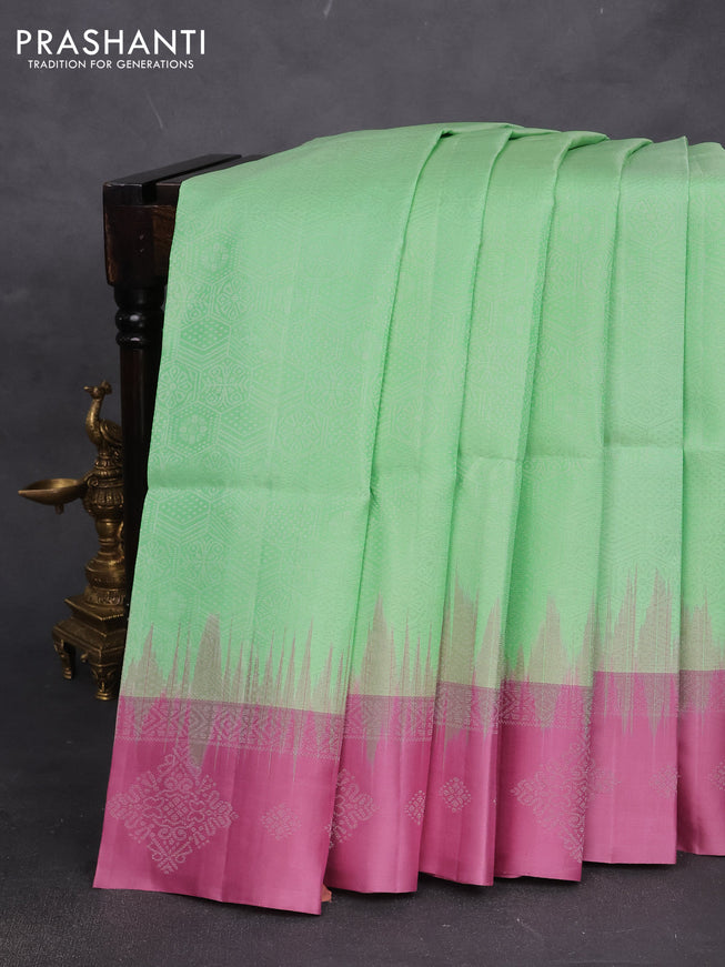 Pure soft silk saree pista green and mauve pink with allover zari woven geometric weaves and silver zari woven border
