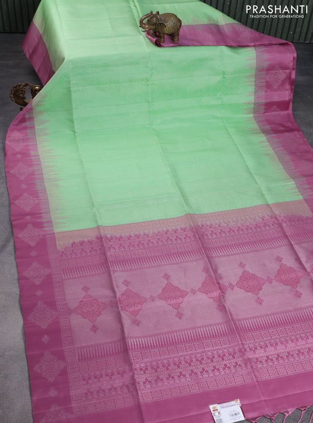 Pure soft silk saree pista green and mauve pink with allover zari woven geometric weaves and silver zari woven border