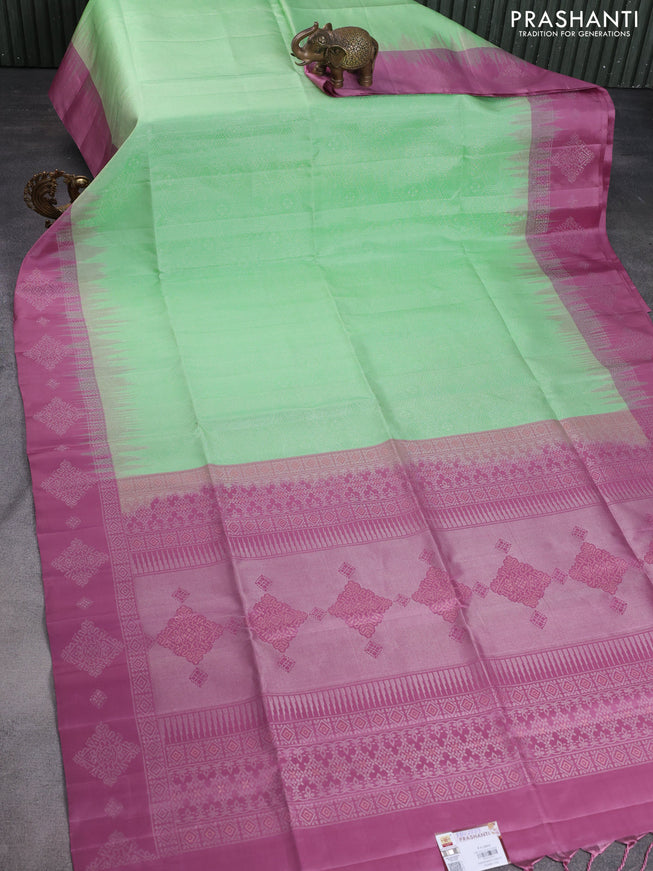 Pure soft silk saree pista green and mauve pink with allover zari woven geometric weaves and silver zari woven border