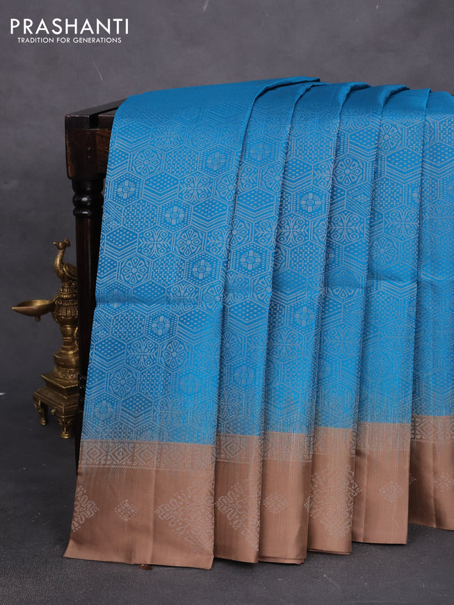 Pure soft silk saree cs blue and brown with allover zari woven geometric weaves and silver zari woven border