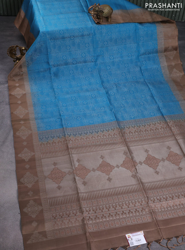 Pure soft silk saree cs blue and brown with allover zari woven geometric weaves and silver zari woven border