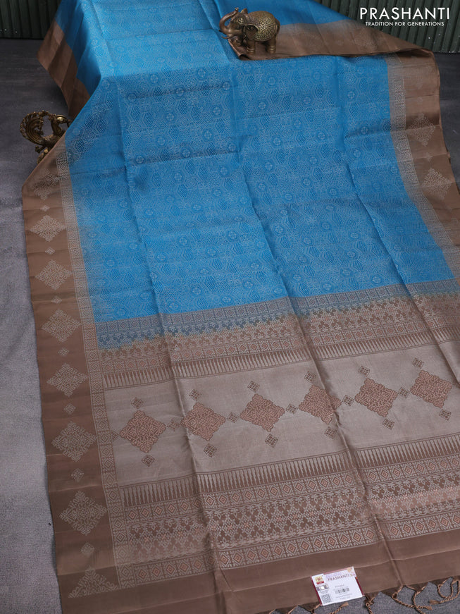 Pure soft silk saree cs blue and brown with allover zari woven geometric weaves and silver zari woven border