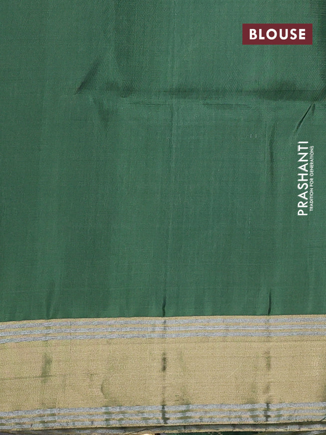 Pure soft silk saree green with allover zari weaves and zari woven simple border