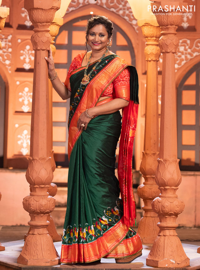 Pochampally silk saree green and red with plain body and long ikat design zari border