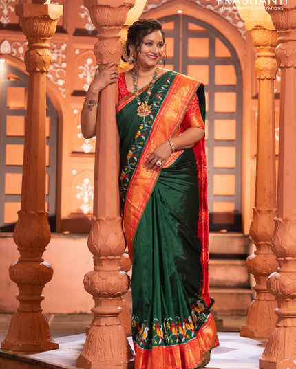 Pochampally silk saree green and red with plain body and long ikat design zari border