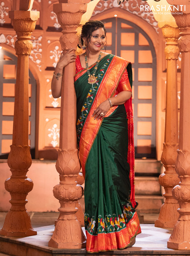 Pochampally silk saree green and red with plain body and long ikat design zari border