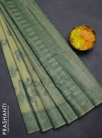 Semi jute silk saree pista green and green with thread woven buttas and warli design weaving pallu