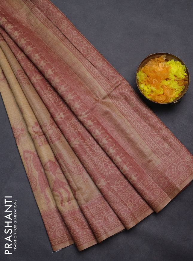 Semi jute silk saree beige and maroon shade with thread woven buttas and warli design weaving pallu