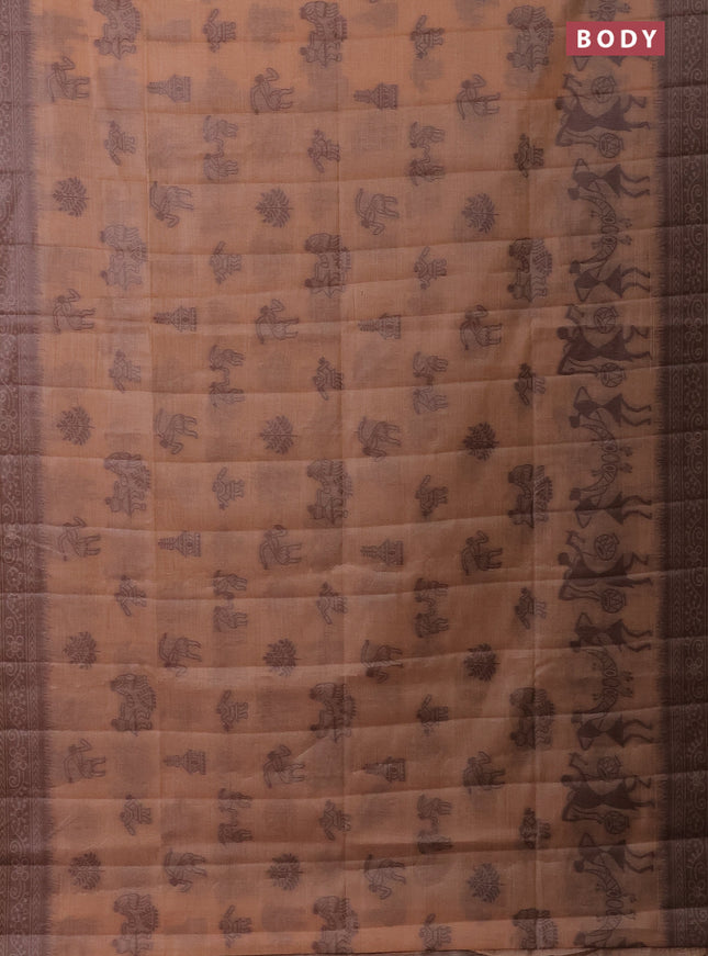 Semi jute silk saree pale orange and brown with thread woven buttas and warli design weaving pallu