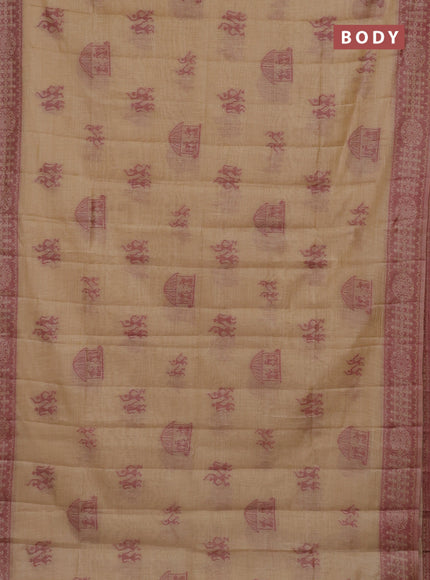 Semi jute silk saree sandal and maroon with thread woven warli buttas and warli design weaving pallu