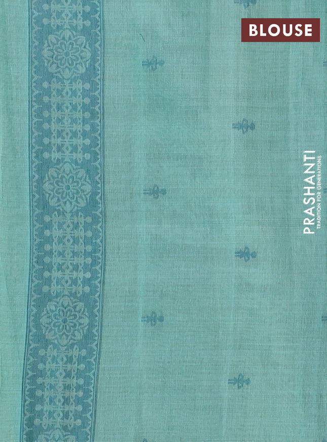 Semi jute silk saree teal green shade and peacock green with thread woven warli buttas and warli design weaving pallu