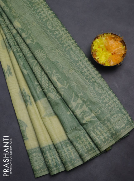 Semi jute silk saree pista green and green with thread woven warli buttas and warli design weaving pallu