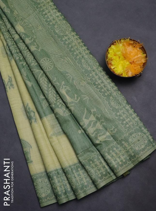 Semi jute silk saree pista green and green with thread woven warli buttas and warli design weaving pallu