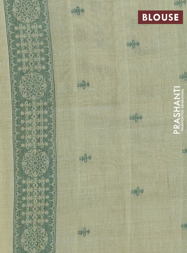 Semi jute silk saree pista green and green with thread woven warli buttas and warli design weaving pallu