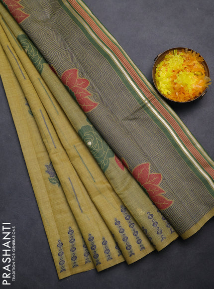 Semi jute silk saree yellow shade and green with thread woven floral buttas and floral design weaving pallu