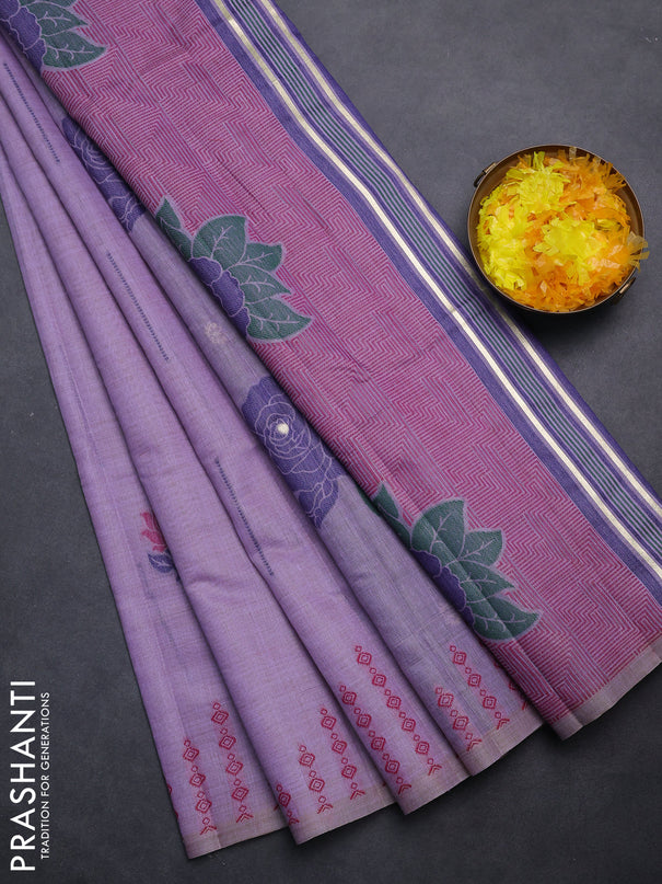 Semi jute silk saree lavender and navy blue with thread woven floral buttas and floral design weaving pallu