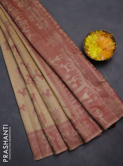 Semi jute silk saree sandal and maroon with warli thread woven buttas and warli design weaving pallu