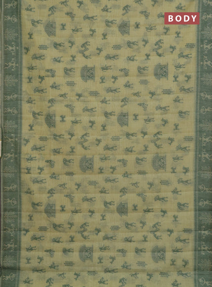 Semi jute silk saree pista green and green with warli thread woven buttas and warli design weaving pallu