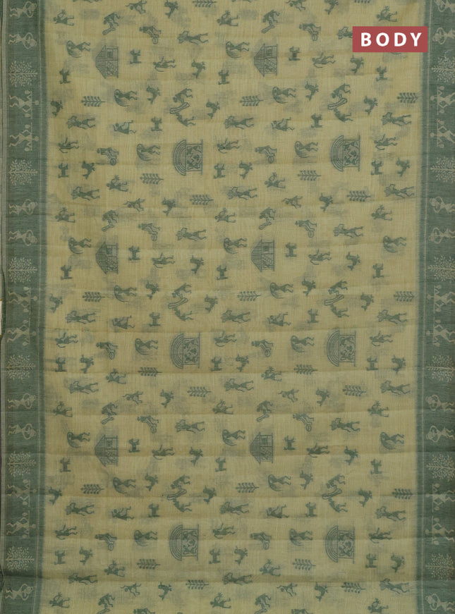 Semi jute silk saree pista green and green with warli thread woven buttas and warli design weaving pallu