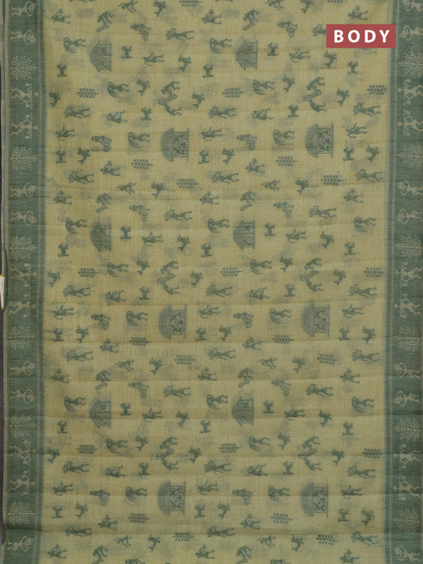 Semi jute silk saree pista green and green with warli thread woven buttas and warli design weaving pallu