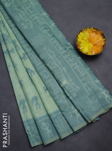 Semi jute silk saree pastel green and green with warli thread woven buttas and warli design weaving pallu