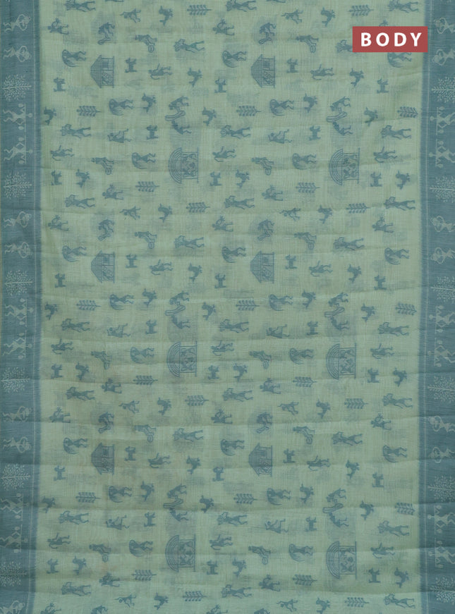 Semi jute silk saree pastel green and green with warli thread woven buttas and warli design weaving pallu