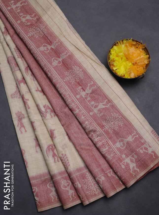 Semi jute silk saree cream and maroon with warli thread woven buttas and warli design weaving pallu