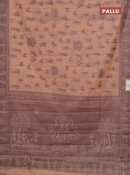 Semi jute silk saree pale orange and brown with warli thread woven buttas and warli design weaving pallu