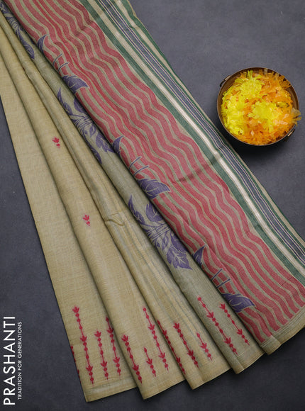 Semi jute silk saree elaichi green and green with thread woven buttas and floral design weaving pallu