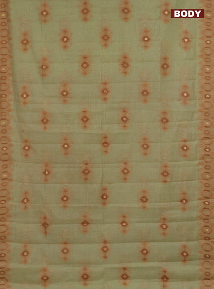 Semi jute silk saree elaichi green and rust shade with thread & zari woven ikat buttas and ikat weaving pallu