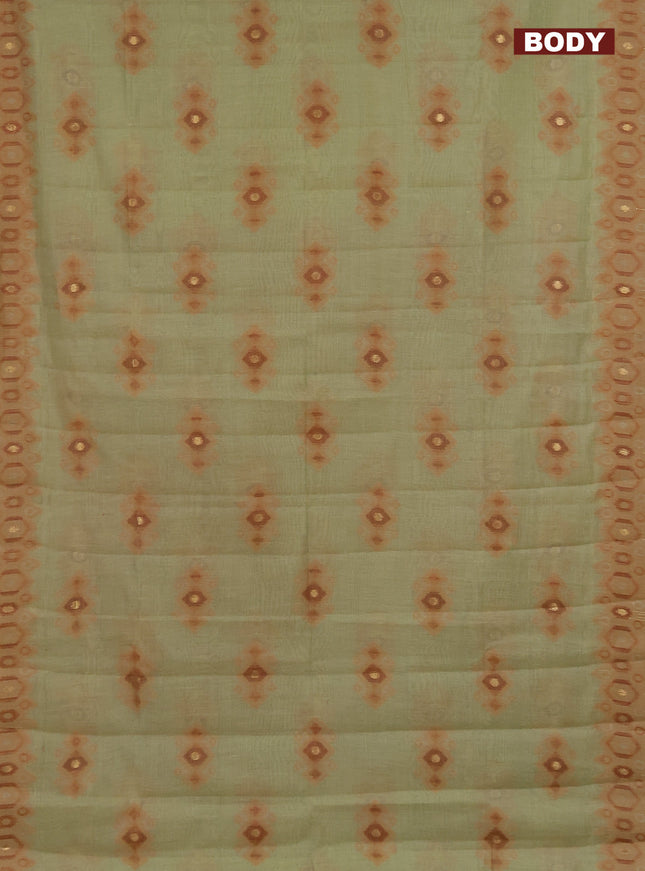 Semi jute silk saree elaichi green and rust shade with thread & zari woven ikat buttas and ikat weaving pallu