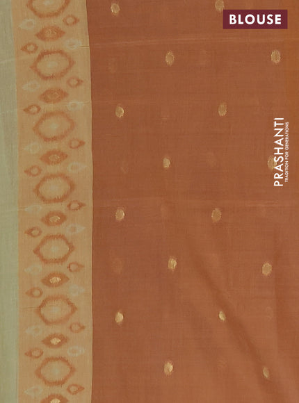 Semi jute silk saree elaichi green and rust shade with thread & zari woven ikat buttas and ikat weaving pallu