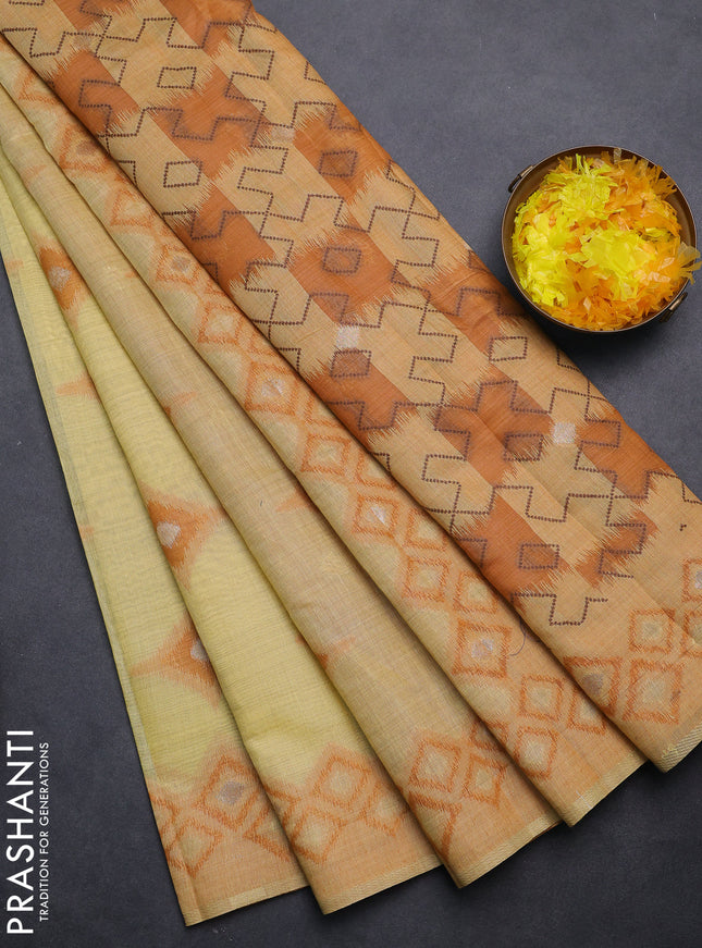 Semi jute silk saree pale yellow and rustic orange with thread & zari woven buttas and ikat weaving pallu