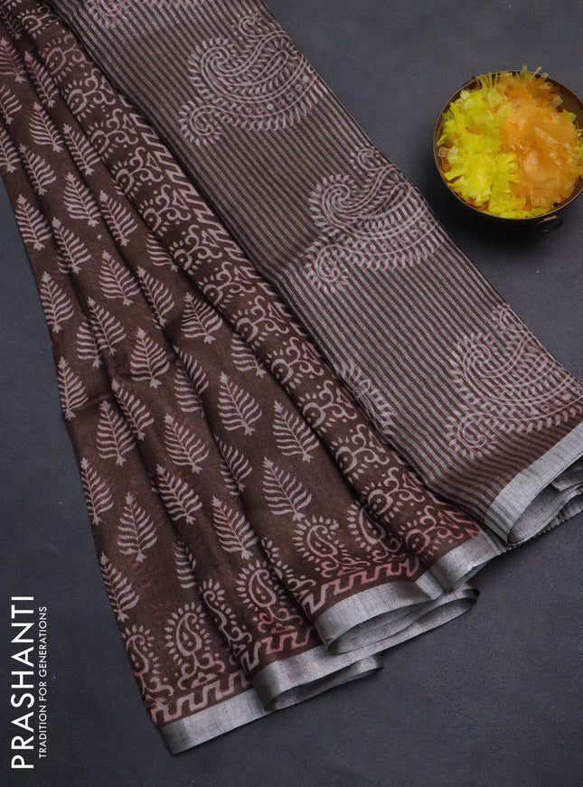 Pure linen saree brown with allover butta prints and silver zari woven border