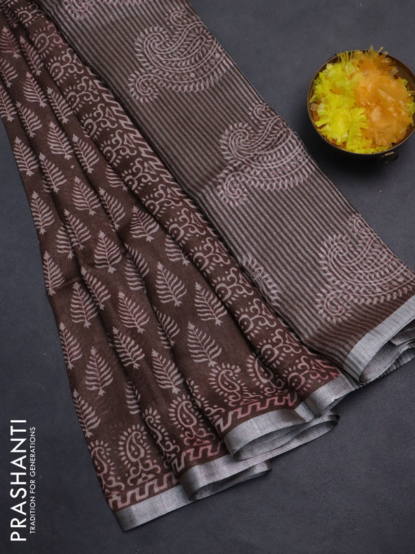 Pure linen saree brown with allover butta prints and silver zari woven border
